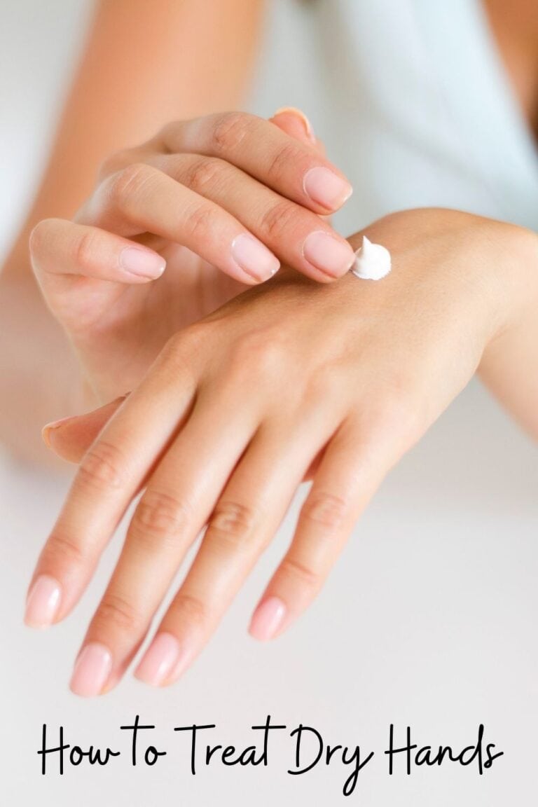 Dry hands being moisturized