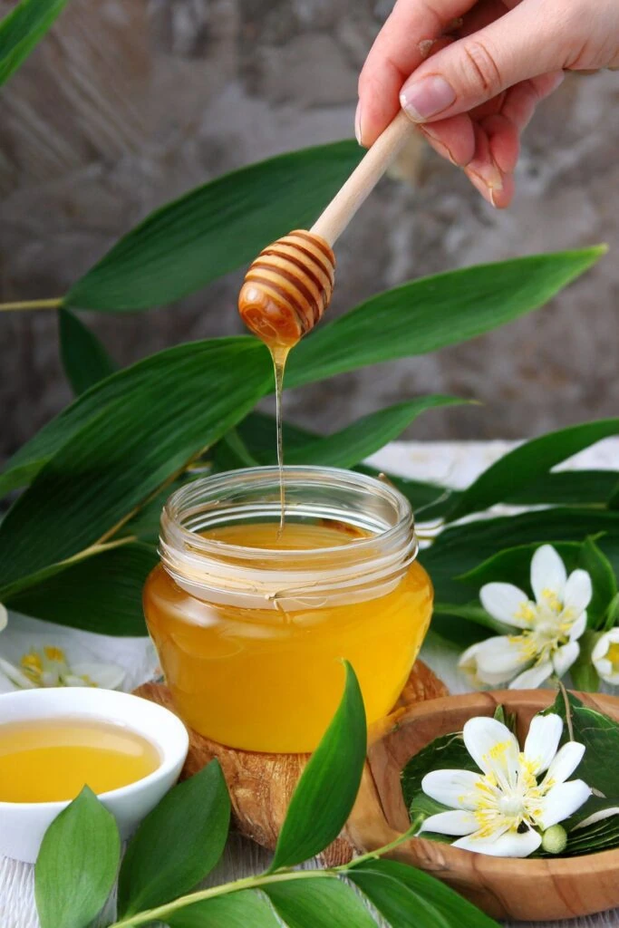 drizzling hair nourishing honey in spa like atmosphere